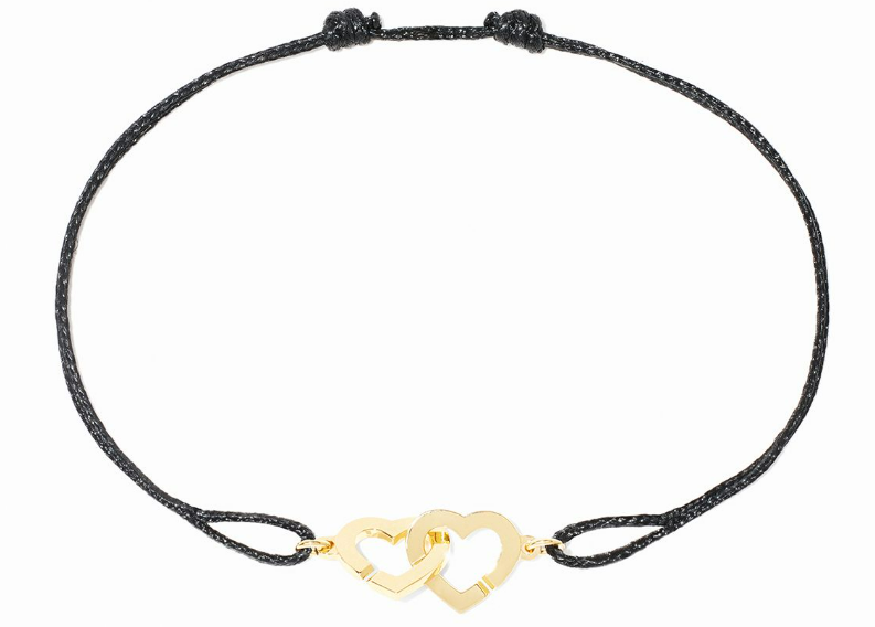 Notre bracelet iconique en menottes cœur qui symbolise l'union et l'amour profond.